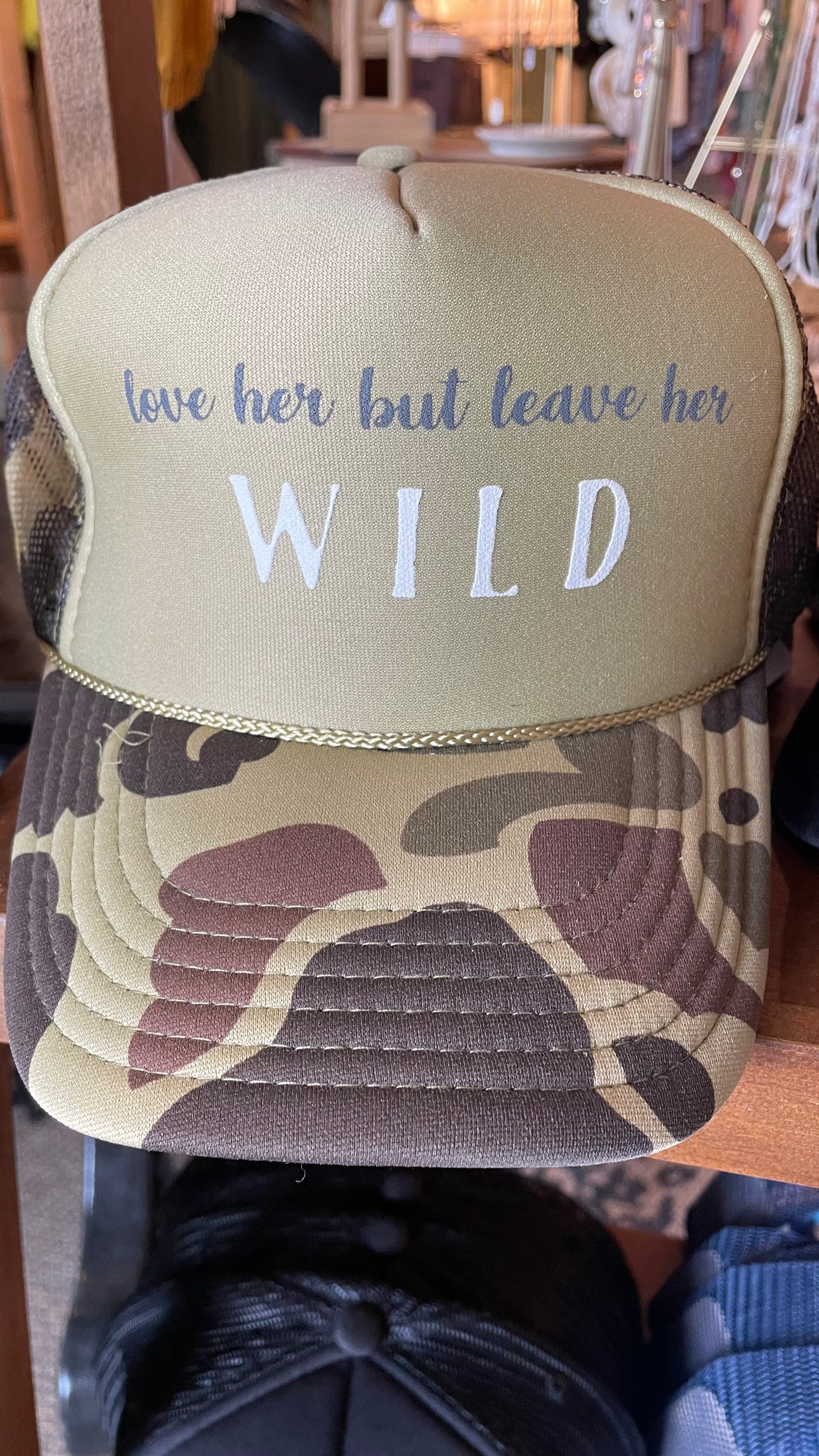 Love her but leave her wild Trucker Hat